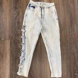 High-Waisted Light Wash Distressed Denim Jeans With Side Cut-Out Bow Details
